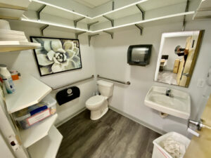 A bathroom with a toilet and sink in it