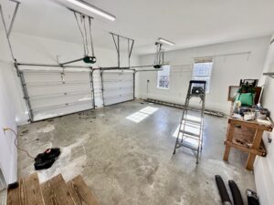 A room with many shelves and ladders in it