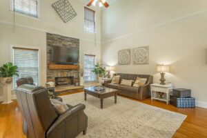 A living room with two couches and a television.