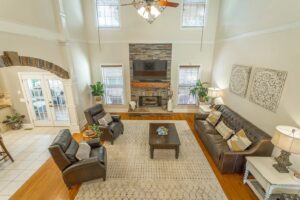 A living room with two couches and a television.