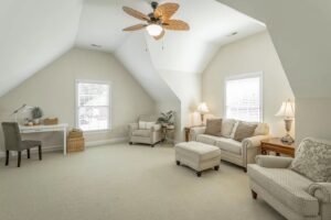 A living room with white walls and furniture.