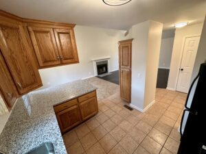 Kitchen with granite countertops and cabinets.