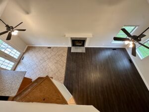 Overhead view of a living room with fireplace.