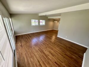 Hardwood floor in empty living room.