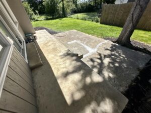 Concrete steps with tree shadow.