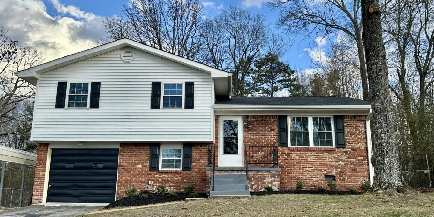 Split-level brick and siding suburban house